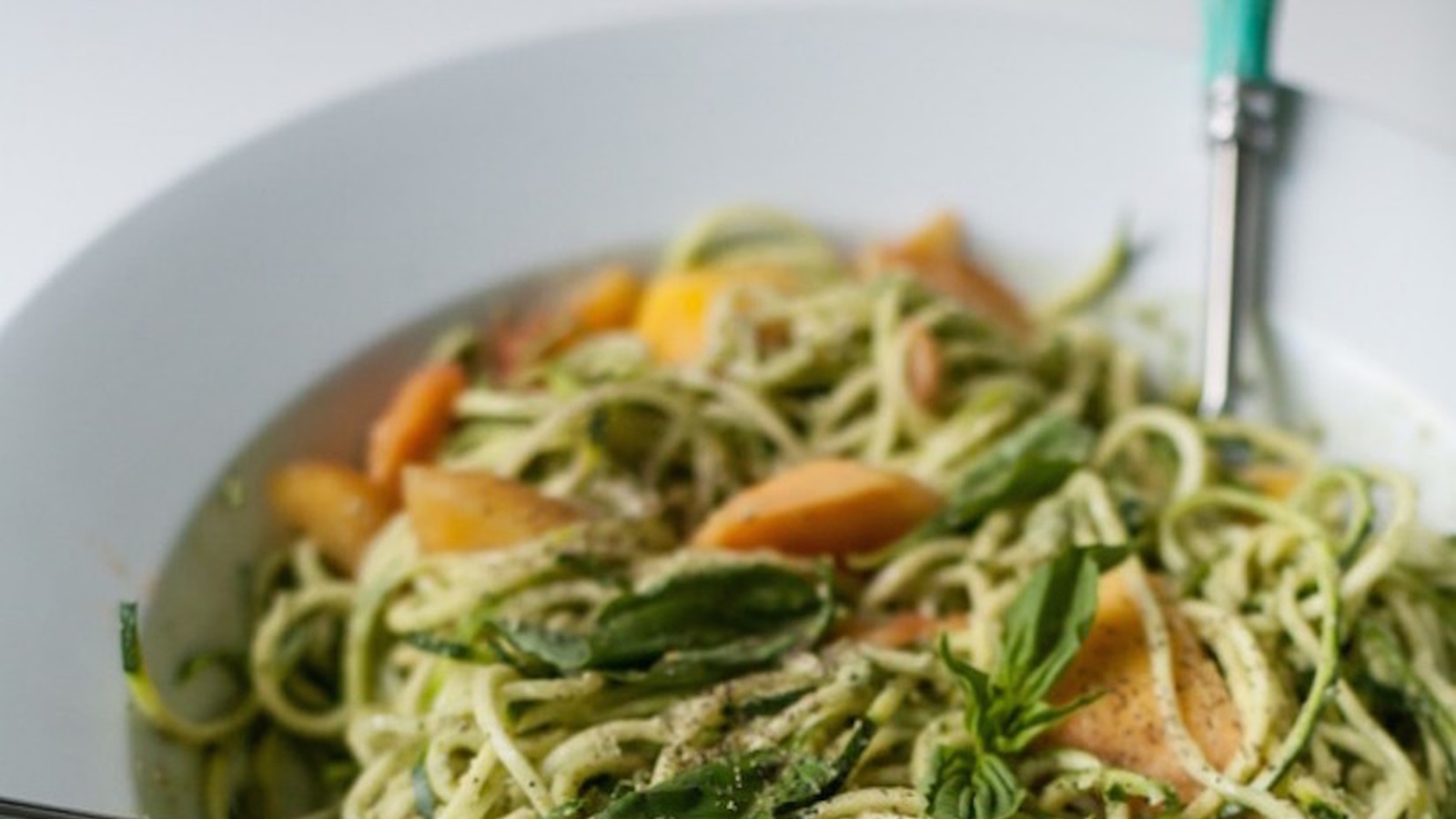 Zucchini Spaghetti With Peaches And Pumpkin Seed Pesto (Recipe)